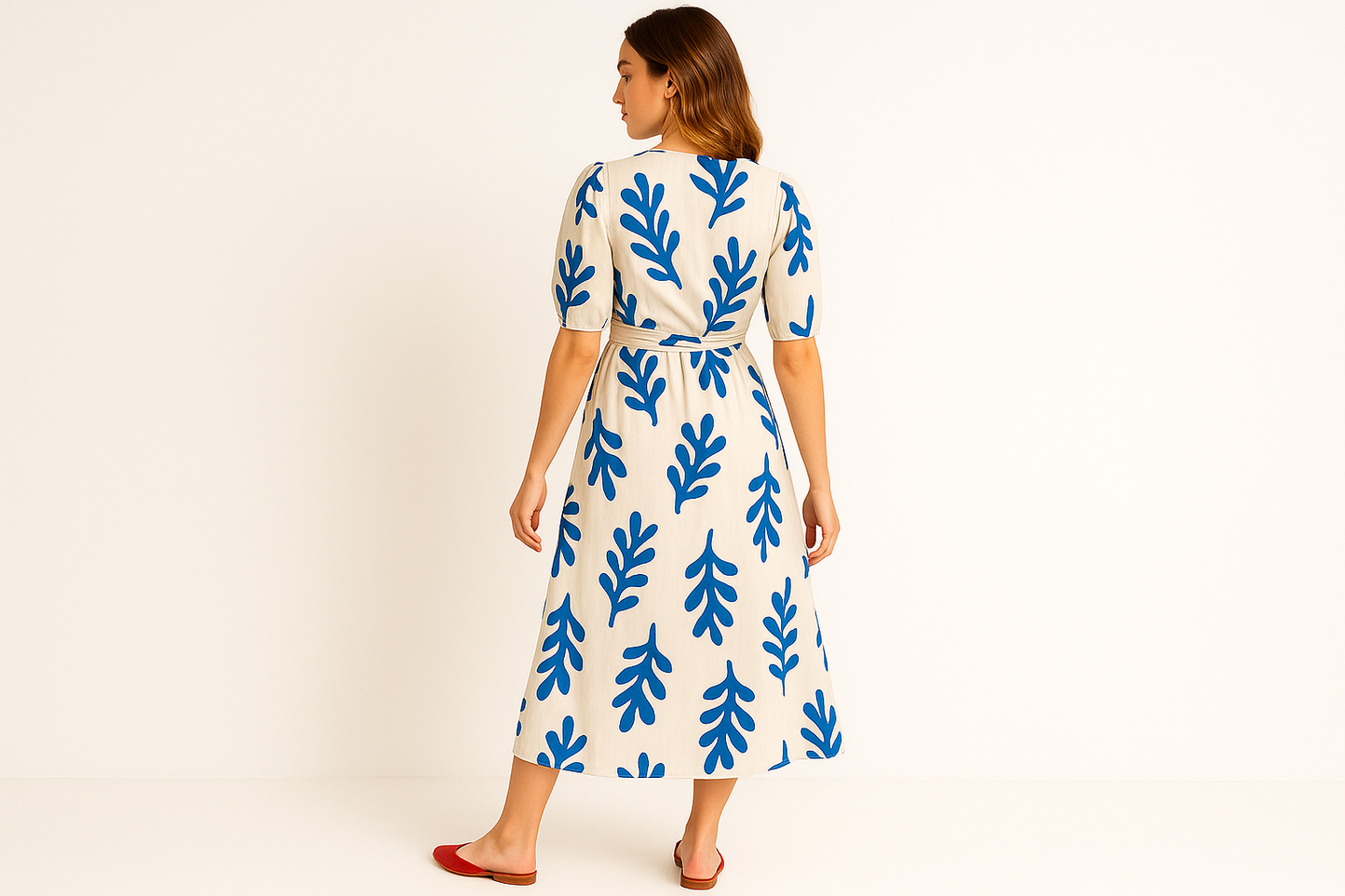 Stylish back view catalog-style image of blue floral wrap dress
